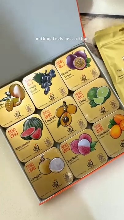 Open Everything Good gift box of 9 Mint Chewy Candy tins in assorted fruit flavours